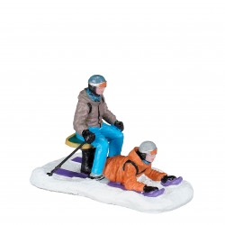 Snowboarder Et Skieur En...